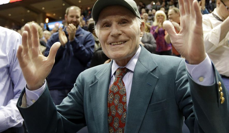 FILE - Milwaukee Bucks owner Herb Kohl is acknowledged by fans during the first half of an NBA basketball game against the Atlanta Hawks, Wednesday, April 16, 2014, in Milwaukee. Herb Kohl, a former Democratic U.S. senator from Wisconsin and former owner of the Milwaukee Bucks basketball team, has died, an email from his foundation said Wednesday, Dec. 27, 2023. He was 88. (AP Photo/Morry Gash, File)