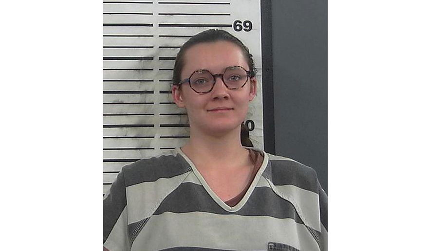 This booking photo provided by the Platte County, Wyo., Sheriff&#x27;s Office shows Lorna Roxanne Green, March 23, 2023, in Wheatland, Wyo. On Tuesday, Dec. 26, a judge ordered Green, who set fire to Wyoming&#x27;s only full-service abortion clinic, to pay nearly $300,000 in restitution, the full amount sought by prosecutors. (Platte County Sheriff&#x27;s Office via AP, File)