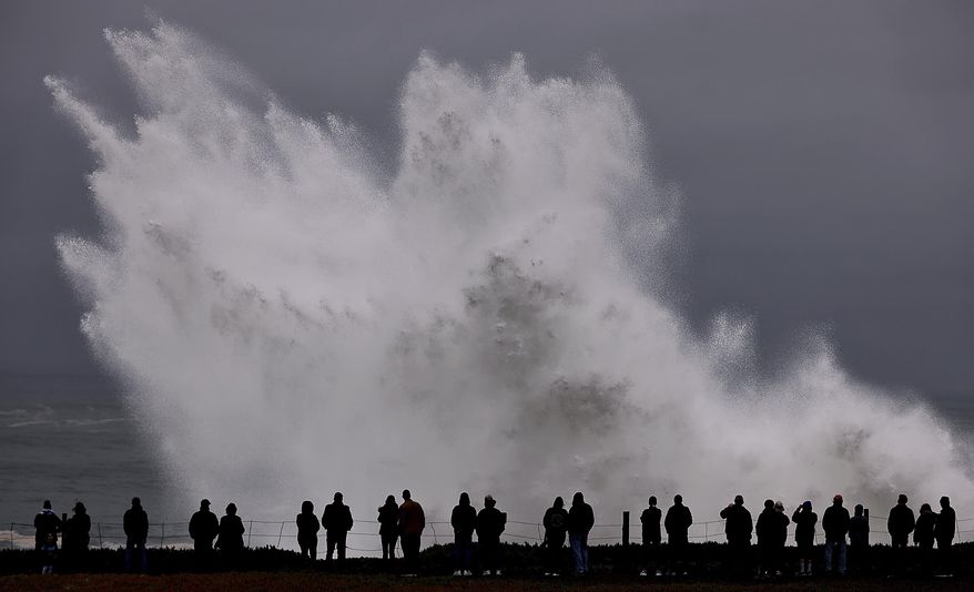 Large waves crash in to Duncan's Landing north of Carmet, Ca., Thursday, Dec. 28, 2023 due to a Pacific storm pummeling Northern California. (Kent Porter/The Press Democrat via AP)