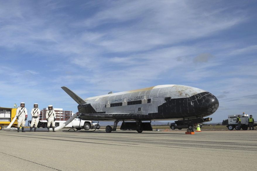 FILE - This undated photo provided by the U.S. Air Force shows an X-37B Orbital Test Vehicle at NASA's Kennedy Space Center in Florida. The U.S. military's X-37B space plane blasted off on Thursday, Dec. 28, 2023, on another secretive mission that’s expected to last at least a couple of years.(U.S. Air Force via AP, File)
