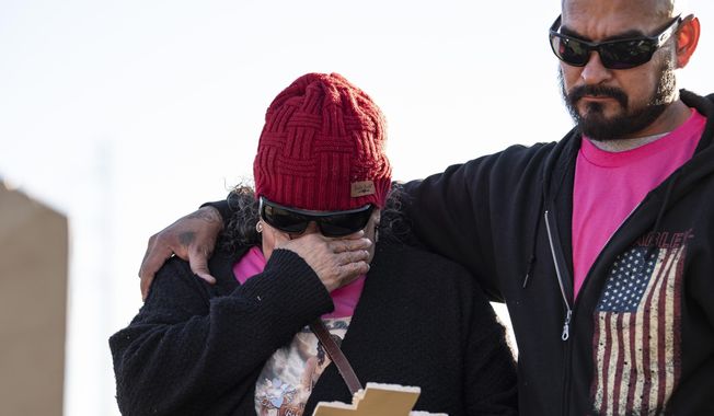 Pedro Soto, right, Savanah&#x27;s father, comforts Rachel Soto, left, Savanah&#x27;s grandmother, at a vigil for Savanah Soto, 18, and her unborn baby Fabian at Kenwood Park on Thursday, Dec. 28, 2023 in San Antonio, Texas. Authorities say Soto and Guerra were found earlier this week with gunshot wounds in a car and may have been dead for days. (Salgu Wissmath /The San Antonio Express-News via AP)