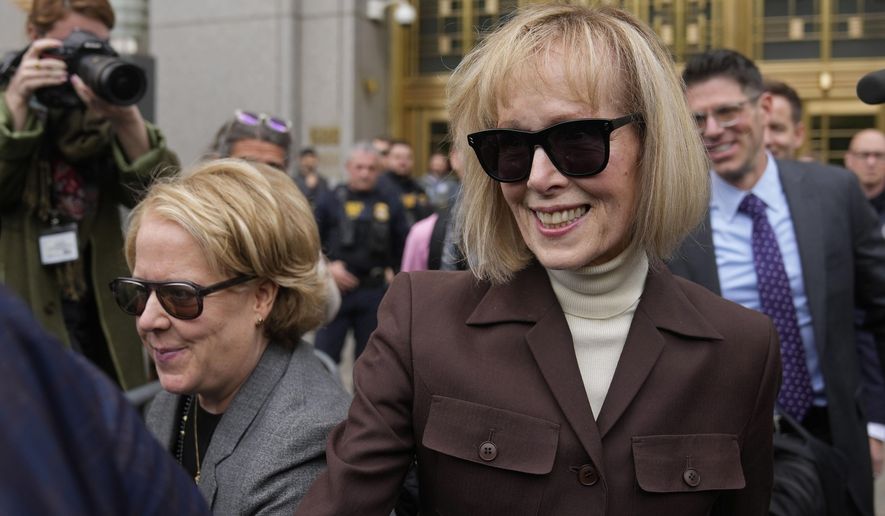 E. Jean Carroll, right, walks out of Manhattan federal court, May 9, 2023, in New York. Lawyers for former President Donald Trump say he may testify at a mid-January trial set to decide how much he owes Carroll for defaming her after she said he sexually abused her three decades ago in a Manhattan department store. The lawyers filed papers in Manhattan federal court late Thursday, Dec. 29, 2023, to request that Trump&#x27;s October 2022 deposition transcript in the case not be shown to the jury because Trump has been named as a witness likely to testify at the trial. (AP Photo/Seth Wenig, File)