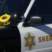A roll of police tape is left on the windshield of a Los Angeles County sheriff&#x27;s vehicle in the parking lot of its training academy in Whittier, Calif., Nov. 16, 2022. (AP Photo/Jae C. Hong, File) **FILE**