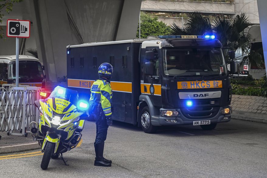 A prison van carrying activist publisher Jimmy Lai arrives at the West Kowloon Magistrates' Courts, where Lai's trial takes place, in Hong Kong, Tuesday, Jan. 2, 2024. (AP Photo/Billy H.C. Kwok)