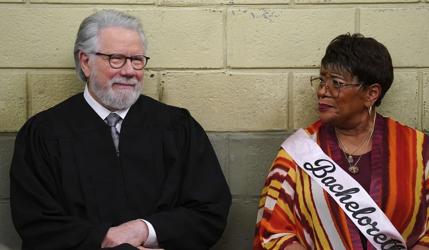 This image released by NBC shows John Larroquette as Dan Fielding, left, and Marsha Warfield as Roz in a scene from the &quot;Night Court&quot; episode entitled &quot;The Roz Affair.&quot; (Nicole Weingart/NBC via AP)