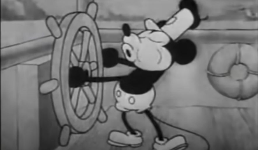 This still image from video provided by Disney shows the character Mickey Mouse in the 1928 animated short "Steamboat Willie." On Monday, Jan. 1, 2024, the iconic character from “Steamboat Willie” entered the public domain after the expiration of the 95-year copyright, and is already the focus of two horror films. (Disney via AP)
