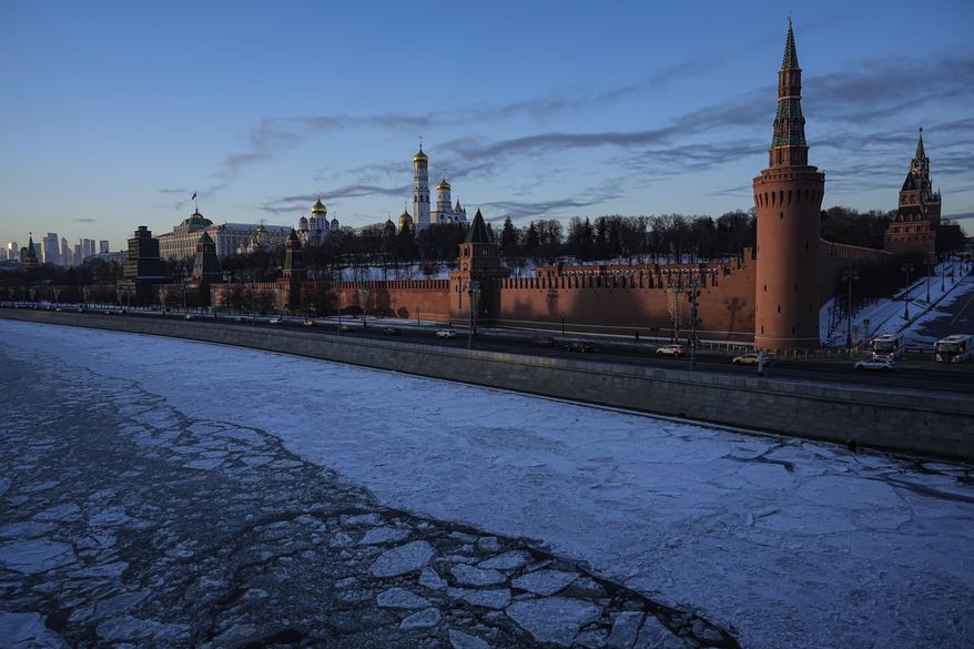 The frozen Moscow River and the Kremlin are seen during cold sunset in Moscow, Russia, on Thursday, Jan. 4, 2024. Russian capital is basking in unusually cold winter weather as temperatures reached around -22 C (-7,6 F) during a day and -25 C (1,3 F) in Moscow. (AP Photo/Alexander Zemlianichenko)