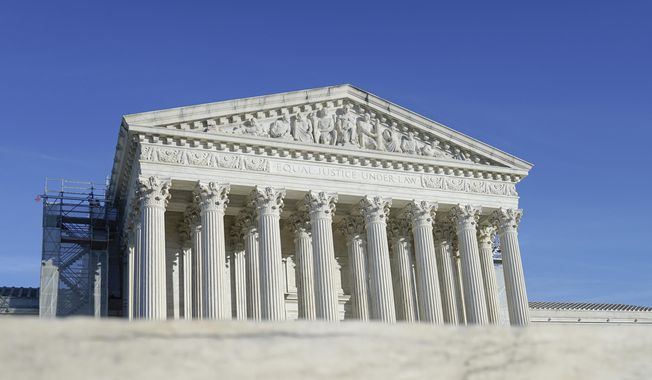 The U.S. Supreme Court is photographed on Friday, Jan. 5, 2024, in Washington. (AP Photo/Mariam Zuhaib)