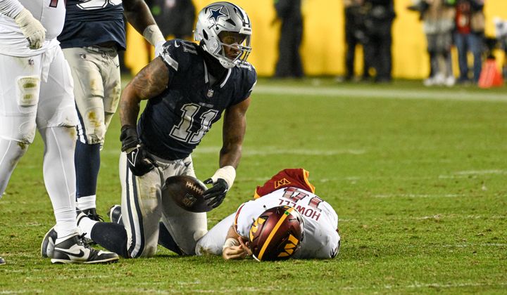 Dallas Cowboys linebacker Micah Parsons (11) after sacking Washington Commanders quarterback Sam Howell (14) during the second half of an NFL game at FedEx Field in Landover, MD, Jan. 7, 2024. (Photo by Billy Sabatini) ** FILE **