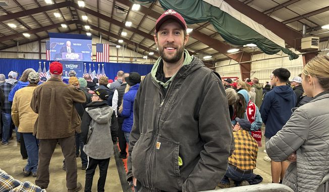 William Caspers, a 37-year-old farmer from Rockwell, Iowa, attends a rally for Donald Trump in Mason City, Iowa, on Friday, Jan. 5, 2024. Caspers says he&#x27;s supporting Trump &quot;100%&quot; in 2024 but wasn&#x27;t sure where or when to caucus for him. Though Trump is the favorite to win the Iowa Republican caucuses, some of his supporters aren&#x27;t well-versed on the complexities of the process and his campaign has scaled back its door-knocking, get-out-the-vote operation in favor of other techniques to motivate supporters. (AP Photo/Steve Peoples)