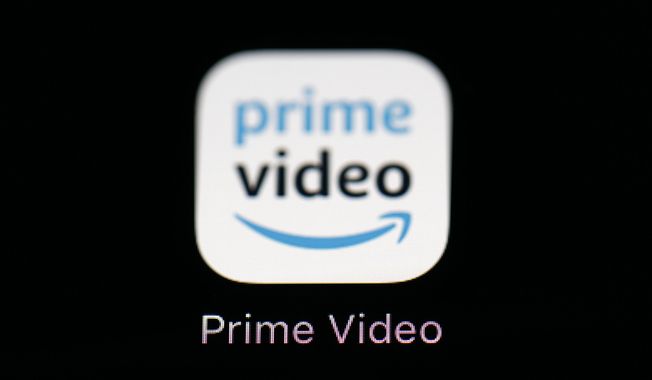 This March 19, 2018 file photo shows Amazon&#x27;s Prime Video streaming app on an iPad in Baltimore. Satan gets top billing in a new adult animated cartoon series launched last week on Amazon Prime. (AP Photo/Patrick Semansky, File)