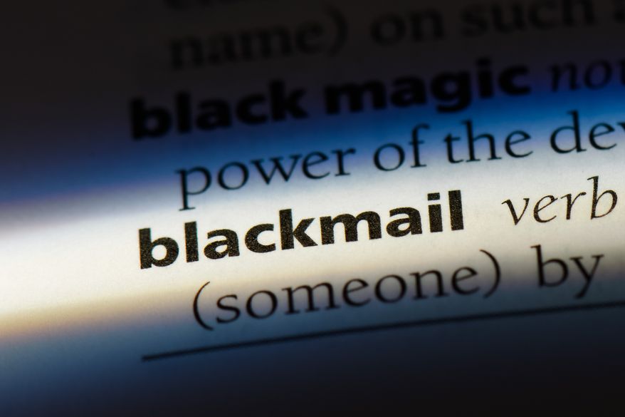 Blackmail word in a dictionary. File photo credit: Casimiro PT.