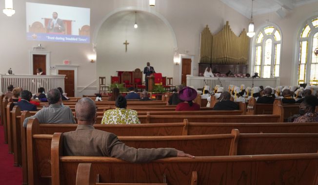 Congregants sit in largely empty pews during service at Zion Baptist Church, April 16, 2023, in Columbia, S.C. Post-pandemic burnout is at worrying levels among Christian clergy in the U.S., prompting many to think about abandoning their jobs, according to a new nationwide survey released Thursday, Jan. 11, 2024. (AP Photo/Jessie Wardarski) **FILE**