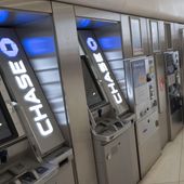 FILE - Chase Bank ATMs are shown, Thursday, March 25, 2021, in New York. (AP Photo/Mark Lennihan, File)
