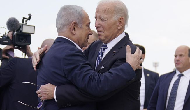 FILE - President Joe Biden is greeted by Israeli Prime Minister Benjamin Netanyahu after arriving at Ben Gurion International Airport, on Oct. 18, 2023, in Tel Aviv. Biden&#x27;s administration keeps pressing Israel for better treatment of Palestinians. Netanyahu mostly keeps saying no. That cycle seems unlikely to end, despite U.S. Secretary of State Antony Blinken&#x27;s fourth urgent diplomatic trip this week to the Middle East since the Israel-Hamas war started. (AP Photo/Evan Vucci)