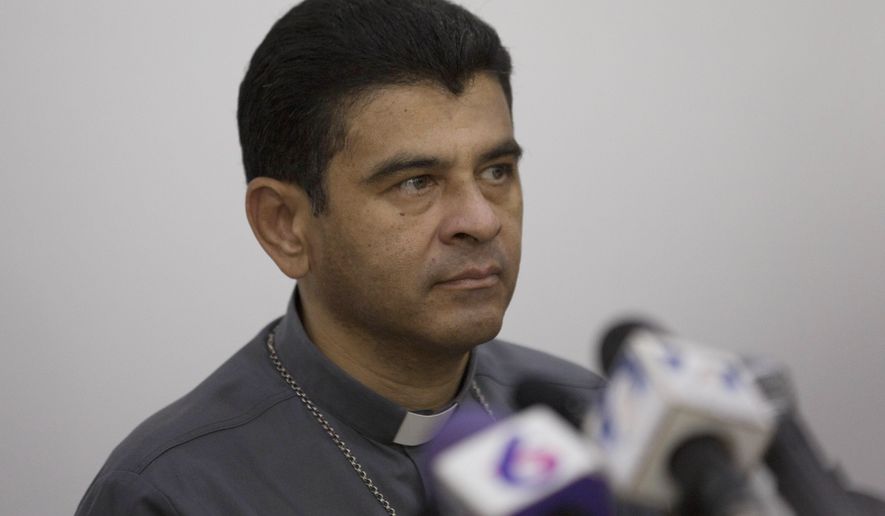 Rolando Alvarez, bishop of Matagalpa, gives a press conference regarding the Roman Catholic Church's agreeing to act as "mediator and witness" in a national dialogue between members of civil society and the government in Managua, Nicaragua, May 3, 2018. Nicaragua's government released Alvarez, sentenced to 26 years in prison for conspiracy and other crimes, and sent him on a plane to the Vatican, according to the auxiliary bishop of Managua, Monsignor Silvio Baez, on Sunday, Jan. 14, 2024. (AP Photo/Moises Castillo, File)