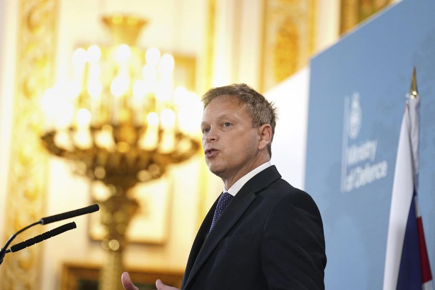 Britain's Defence Secretary Grant Shapps delivers a speech at Lancaster House, in London, Monday, Jan. 15, 2024. The Defence Secretary pledges to send 20,000 British military personnel to a major NATO exercise in eastern Europe. (Stefan Rousseau/PA via AP)