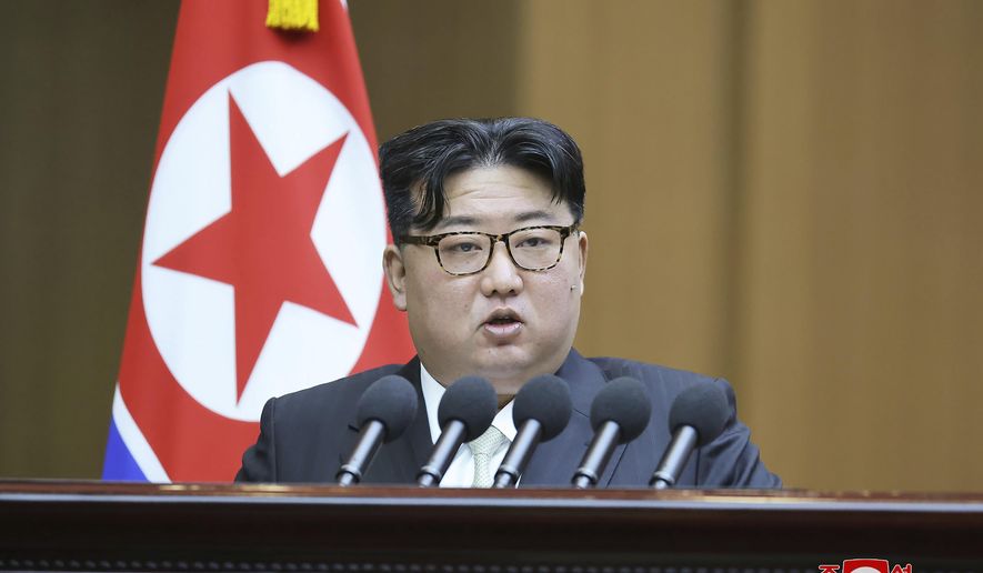 In this photo provided by the North Korean government, North Korean leader Kim Jong Un speaks at the Supreme People’s Assembly in Pyongyang, North Korea Monday, Jan. 15, 2024. Independent journalists were not given access to cover the event depicted in this image distributed by the North Korean government. The content of this image is as provided and cannot be independently verified. Korean language watermark on image as provided by source reads: "KCNA" which is the abbreviation for Korean Central News Agency. (Korean Central News Agency/Korea News Service via AP)