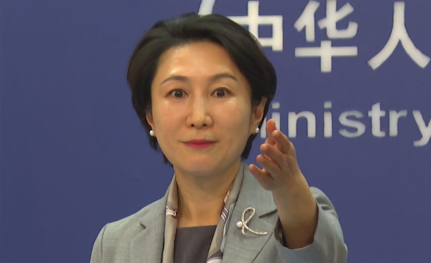 In this image made from video, Chinese Foreign Ministry spokesperson Mao Ning gestures during a press conference in Beijing, China, on Tuesday, Jan. 16, 2024. (AP Photo/Liu Zheng) ** FILE **