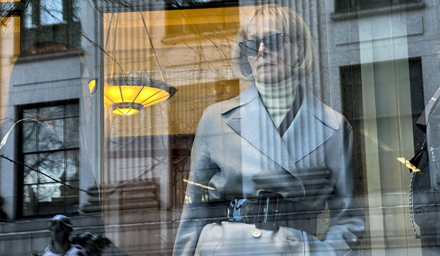 E. Jean Carroll arrives at Manhattan federal court, Wednesday, Jan. 17, 2024, in New York. Less than a year after convincing a jury that former President Donald Trump sexually abused her decades ago, writer E. Jean Carroll is set to take the stand again to describe how his verbal attacks affected her after she came forward. (AP Photo/Ted Shaffrey)