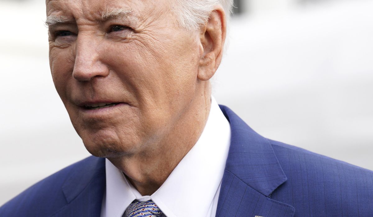 NextImg:Biden says he took photo with congresswoman in North Carolina before realizing she wasn’t there
