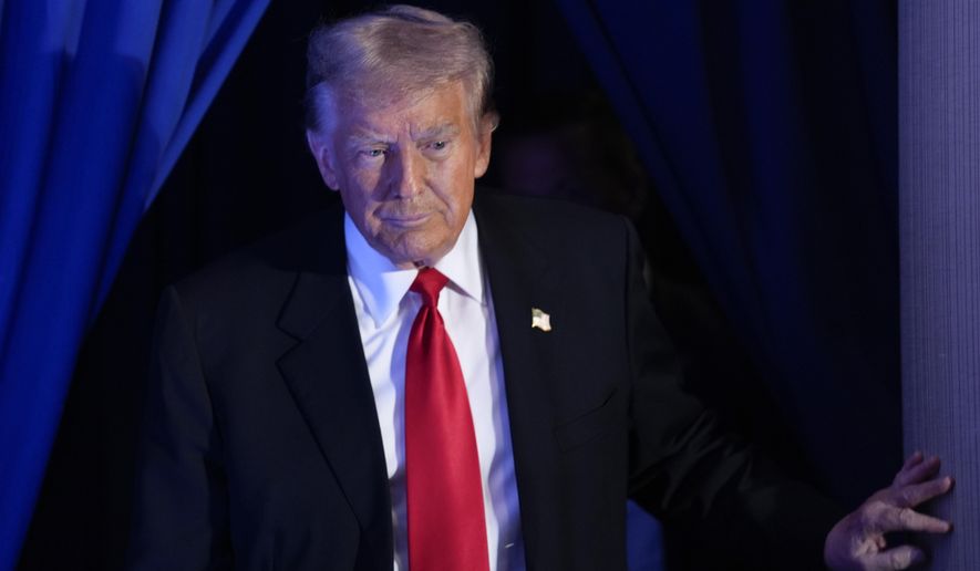 Republican presidential candidate former President Donald Trump arrives at a campaign event in Portsmouth, N.H., Wednesday, Jan. 17, 2024. (AP Photo/Matt Rourke)