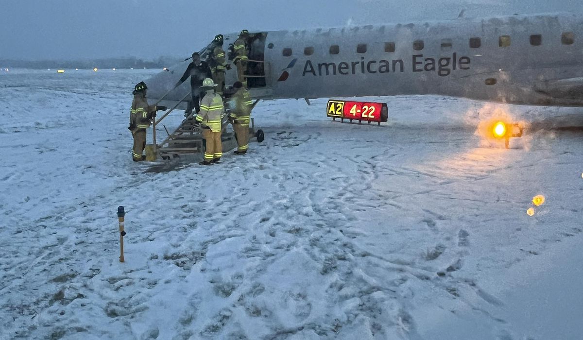 NextImg:WATCH: Plane slides off snowy taxiway in Rochester, New York