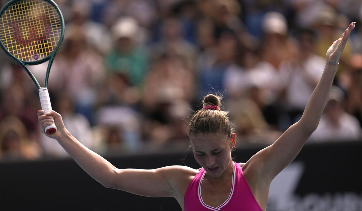 NextImg:Without handshakes, Ukrainian players trying to keep message alive at Australian Open