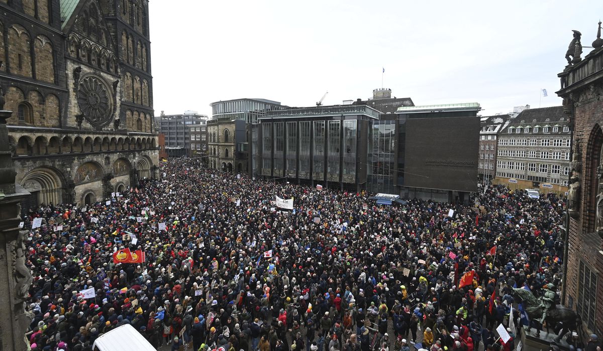 NextImg:Across Germany, anti-far right protests draw hundreds of thousands — in Munich, too many for safety