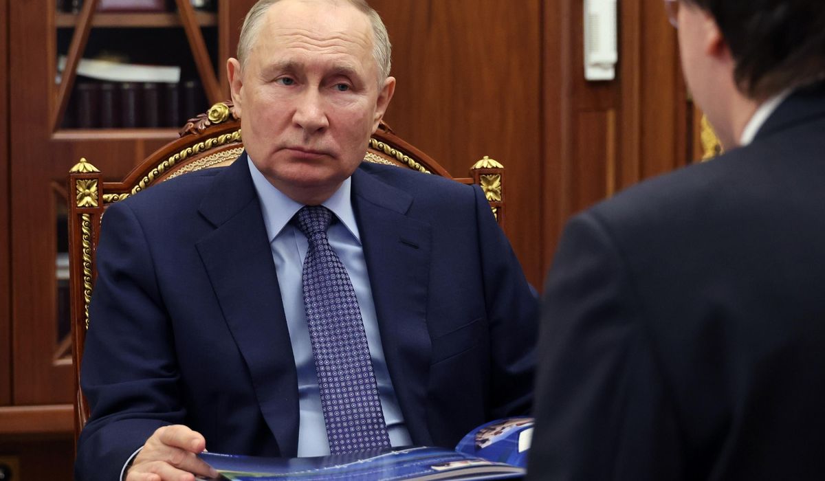 NextImg:Putin’s campaign presents scores of boxes filled with petitions backing his run in March election