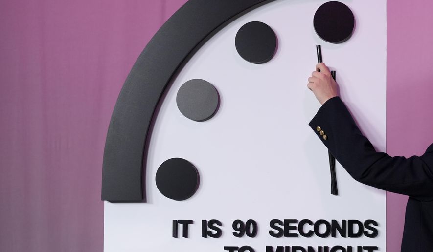 The Bulletin of the Atomic Scientists announces the latest decision on the "Doomsday Clock" minute hand, Tuesday, Jan. 23, 2024, at the National Press Club Broadcast Center, in Washington. This year, Jan. 2024, the clock will remain set to 90 seconds to midnight. (AP Photo/Jacquelyn Martin)