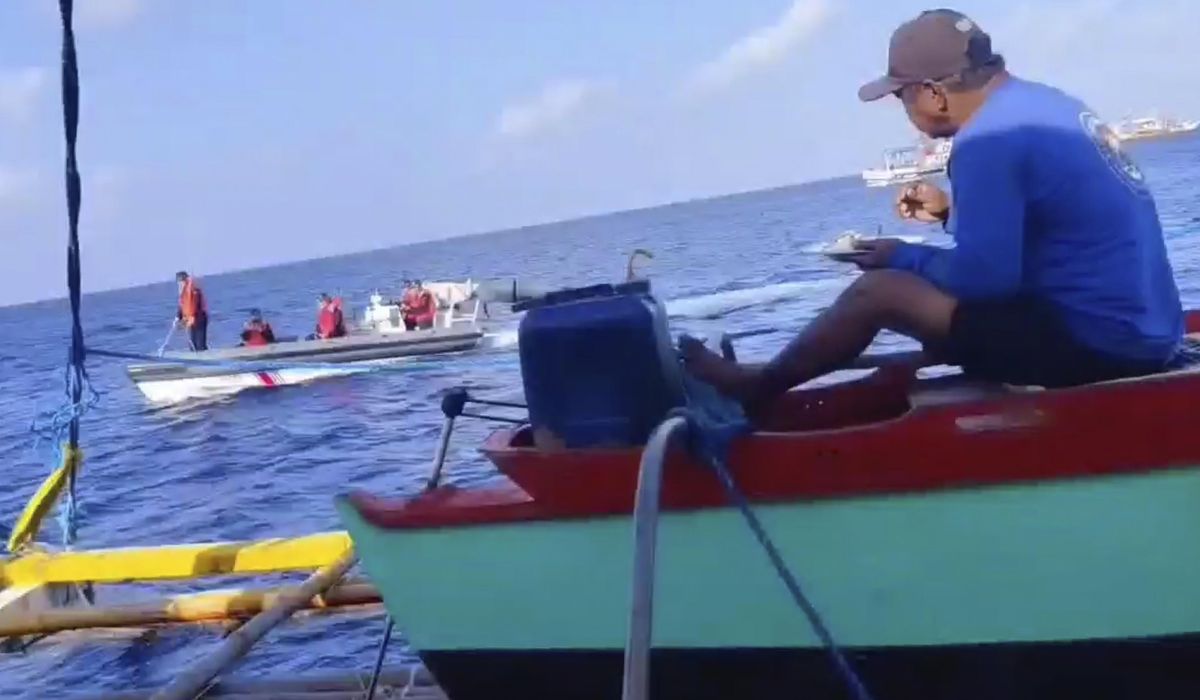 NextImg:Filipino fisherman to Chinese coast guard in disputed shoal: `This is not your territory. Go away.’