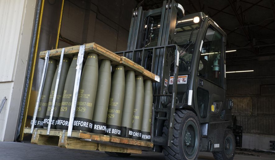 Airmen with the 436th Aerial Port Squadron use a forklift to move 155 mm shells ultimately bound for Ukraine, April 29, 2022, at Dover Air Force Base, Del. For almost 20 months the Pentagon has spearheaded a monthly gathering of about 50 allies where the U.S. has led the way in sending billions of dollars in aid to Kyiv. But on Jan. 23, 2024, for the first time since Secretary of Defense Lloyd Austin established the group in April of 2022, the U.S. will come to the table out of money, unable to send Ukraine the ammunition and missiles it needs to fend off Russia. (AP Photo/Alex Brandon, File)