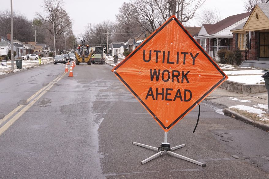 FILE - Memphis Light Gas & Water makes repairs to a broken water main in north Memphis, Tenn., Monday, Jan. 22, 2024. Memphis' water company lifted a boil-water advisory for more than 600,000 people on Tuesday, Jan. 23, five days after the precaution was put in place due to freezing temperatures that caused pipes to break throughout the southern city. (AP Photo/Karen Pulfer Focht, File)
