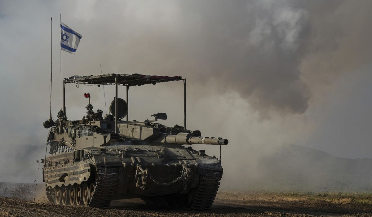 NextImg:Live updates | Death toll rises to 12 with dozens injured in a strike on a crowded Gaza shelter