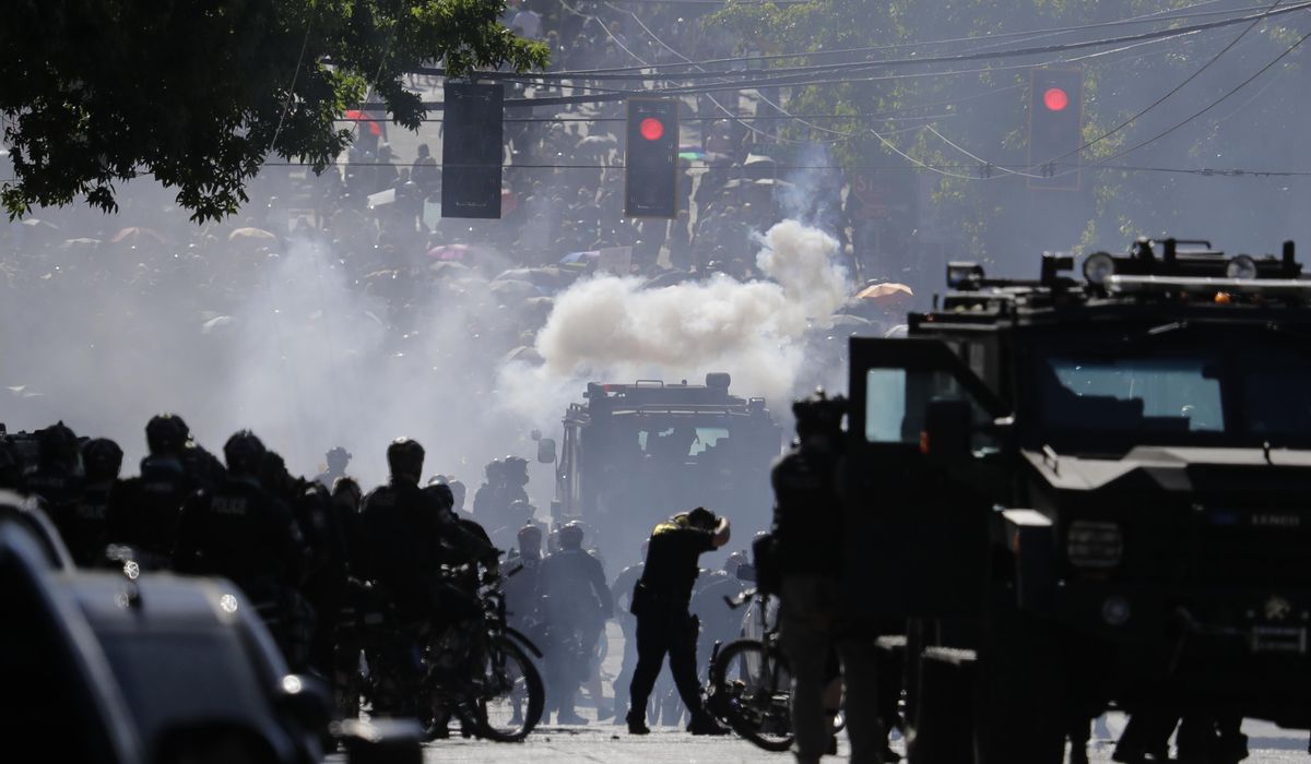 NextImg:Seattle to pay $10 million to protesters who said police used excessive force during 2020 protests