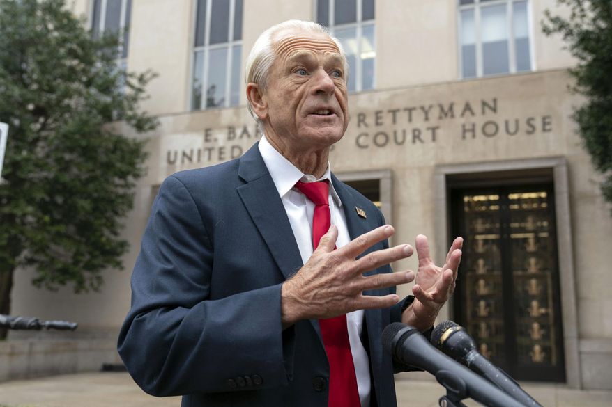 Former Trump White House official Peter Navarro talks to the media as he arrives at the U.S. federal courthouse in Washington, Thursday, Jan. 25, 2024. (AP Photo/Jose Luis Magana) ** FILE **