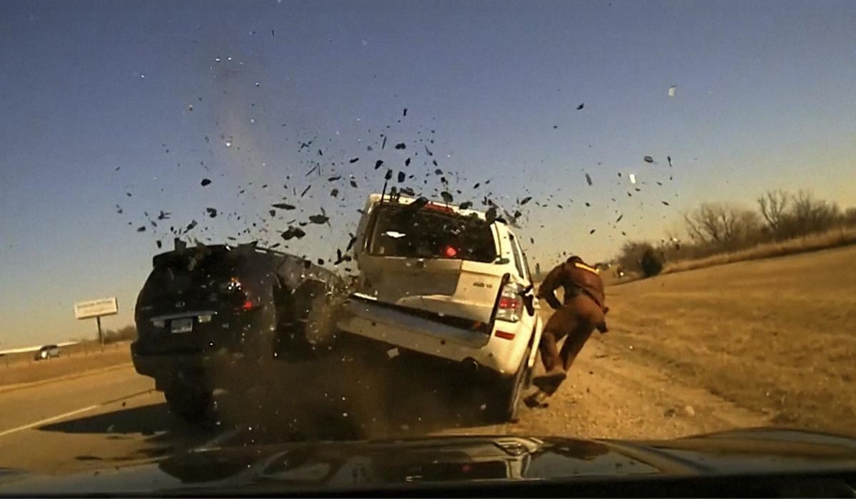 NextImg:Oklahoma trooper thrown as car hits one he had pulled over