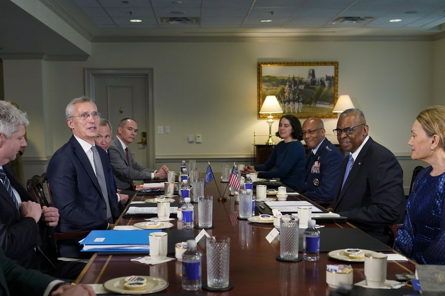 Defense Secretary Lloyd Austin, second from right, meets with NATO Secretary General Jens Stoltenberg, second from left, at the Pentagon in Washington, Monday, Jan. 29, 2024. (AP Photo/Susan Walsh)