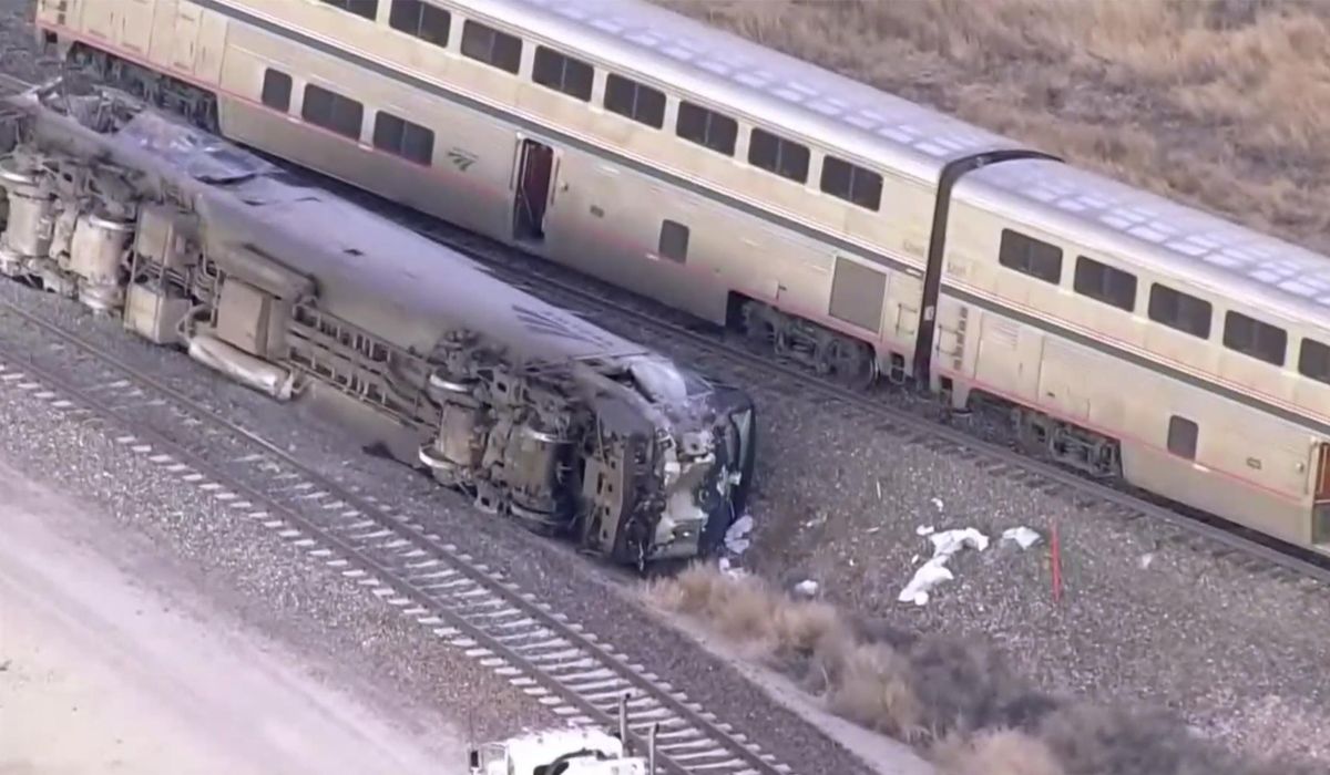 NextImg:At least 2 people hospitalized after Amtrak train derails hits milk truck in Colorado