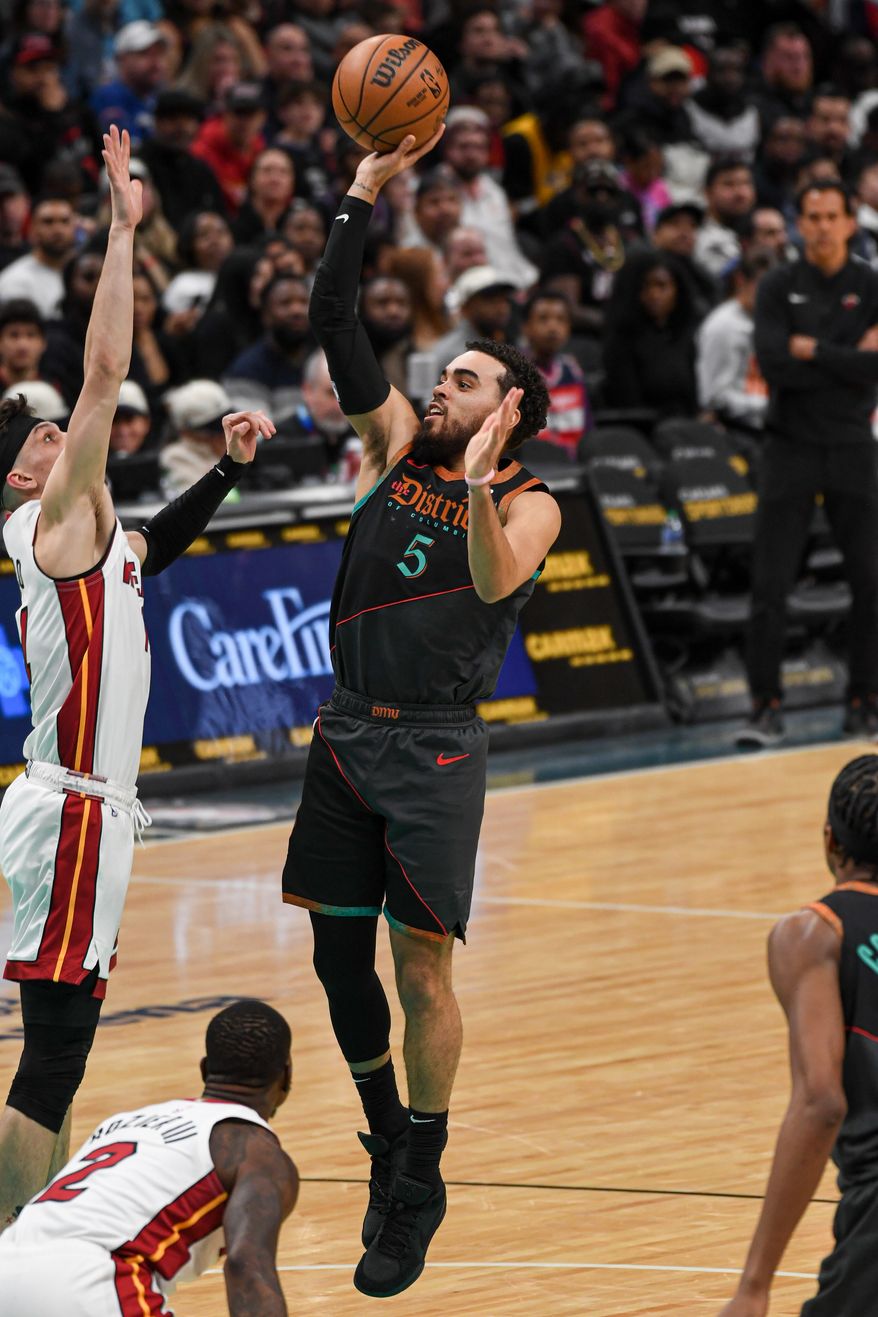 Washington Wizards guard Tyus Jones (5) taking a shot during the second quarter of an NBA game against the Miami Heat at Capital One Arena in Washington D.C., February 2, 2024. (Photo by Billy Sabatini)