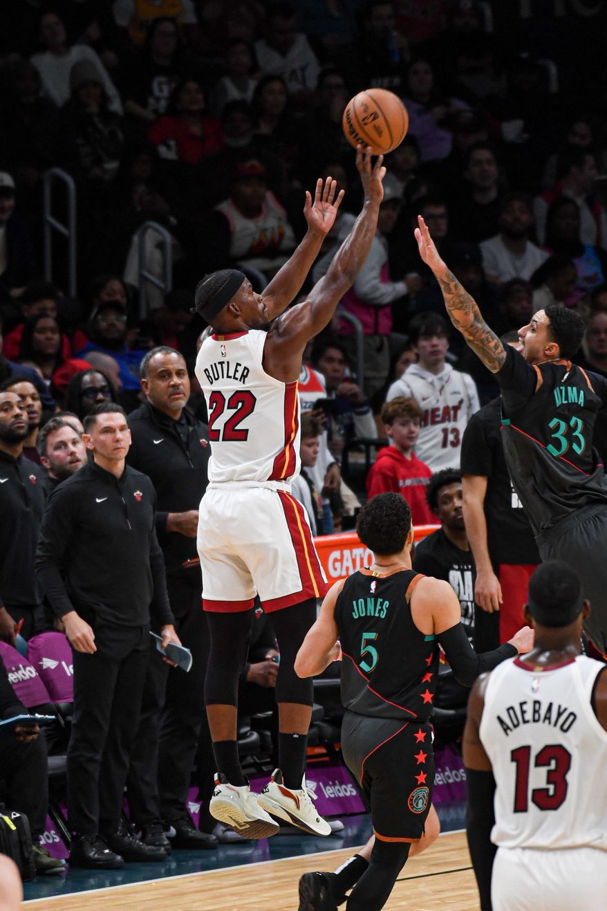 Miami Heat forward Jimmy Butler (22) taking a shot during the second quarter of an NBA game against the Washington Wizards at Capital One Arena in Washington D.C., February 2, 2024. (Photo by Billy Sabatini)