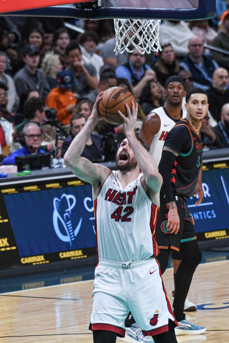 Miami Heat forward Kevin Love (42) putting the ball up during the third quarter of an NBA game against the Washington Wizards at Capital One Arena in Washington D.C., February 2, 2024. (Photo by Billy Sabatini)