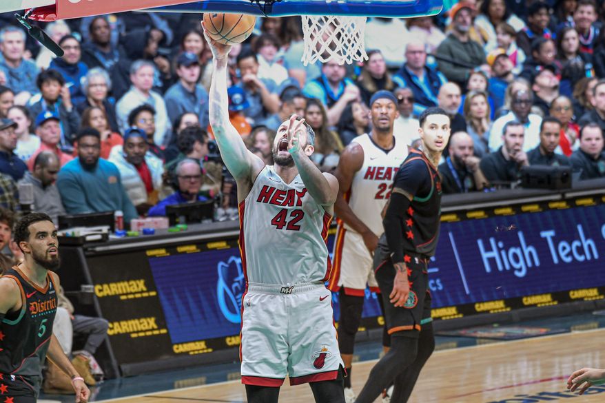 Miami Heat forward Kevin Love (42) putting the ball up during the third quarter of an NBA game against the Washington Wizards at Capital One Arena in Washington D.C., February 2, 2024. (Photo by Billy Sabatini)