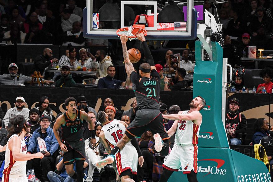 Washington Wizards center Daniel Gafford (21) slamming the ball down during the third quarter of an NBA game against the Miami Heat at Capital One Arena in Washington D.C., February 2, 2024. (Photo by Billy Sabatini)