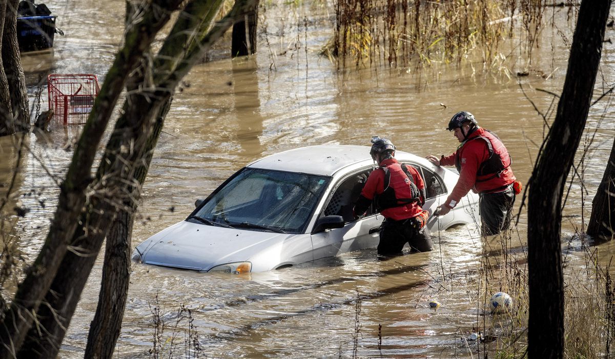 NextImg:Second atmospheric river in days churns through California, knocking out power and flooding roads