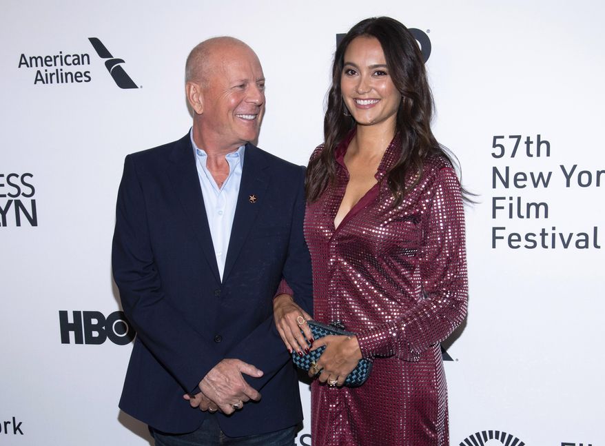 Actor Bruce Willis, left, and Emma Heming Willis attend the "Motherless Brooklyn" premiere during the 57th New York Film Festival on Oct. 11, 2019. Heming Willis is working on a guide to care giving that draws upon her experiences tending to her husband who has been diagnosed with frontotemporal dementia. The book, currently untitled, is scheduled for 2025. (Photo by Charles Sykes/Invision/AP, File)