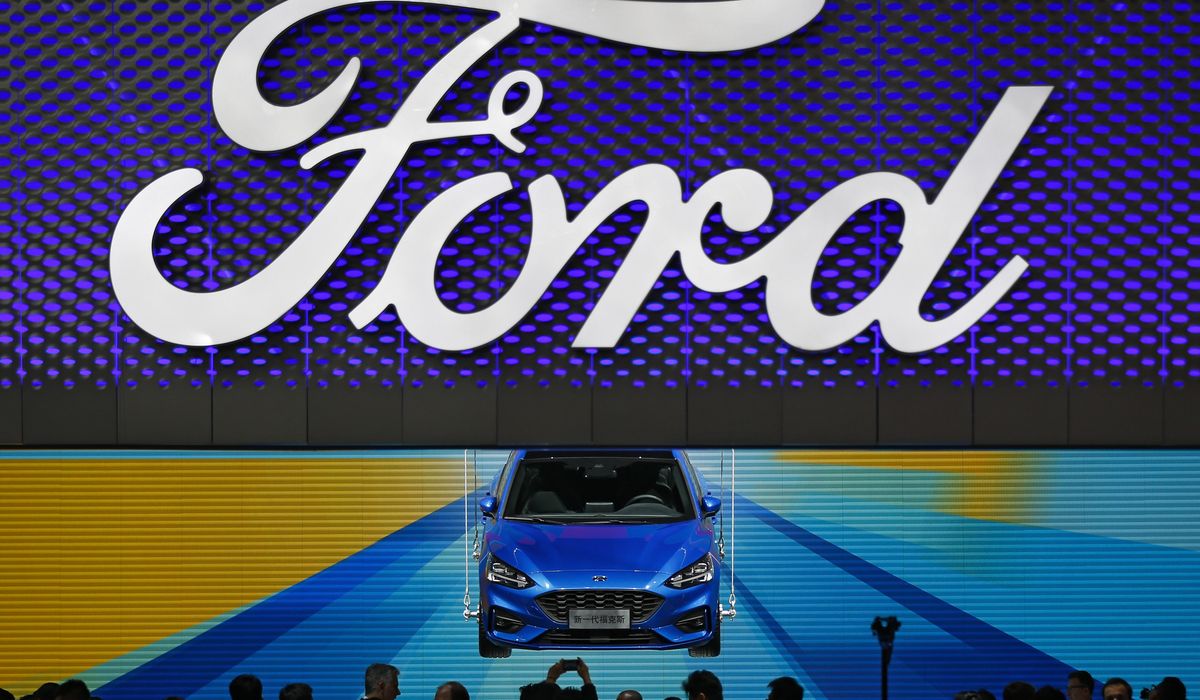 NextImg:Ford shares surge amid rise in earnings, dividends