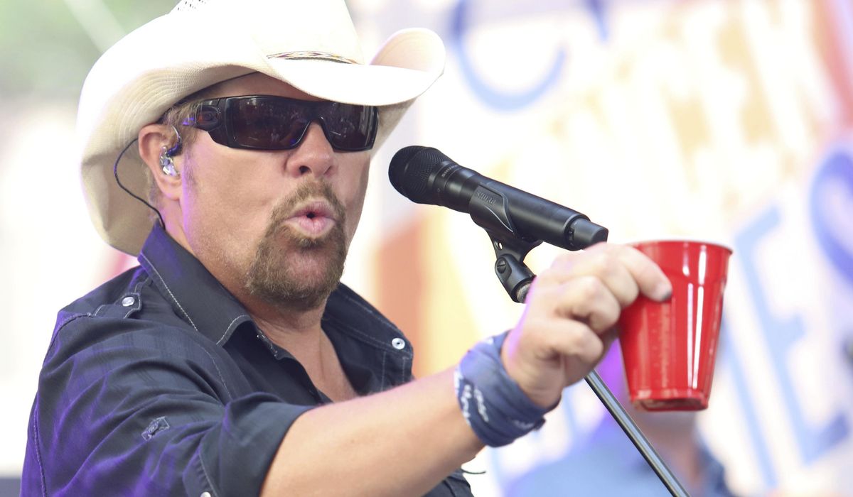 NextImg:Fans raise a red Solo cup to honor Toby Keith, who immortalized the humble cup in song