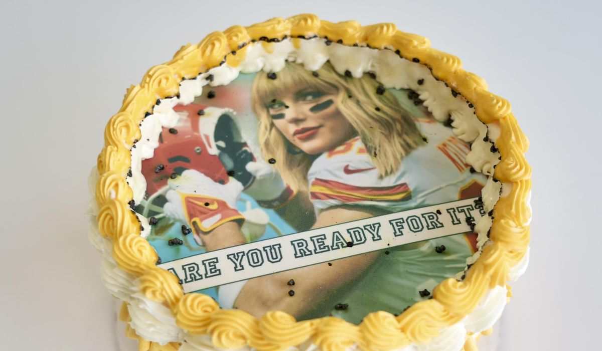 NextImg:Ignitable cakes and sweatshirts: Travis Kelce, Taylor Swift gear flies off shelves in Kansas City